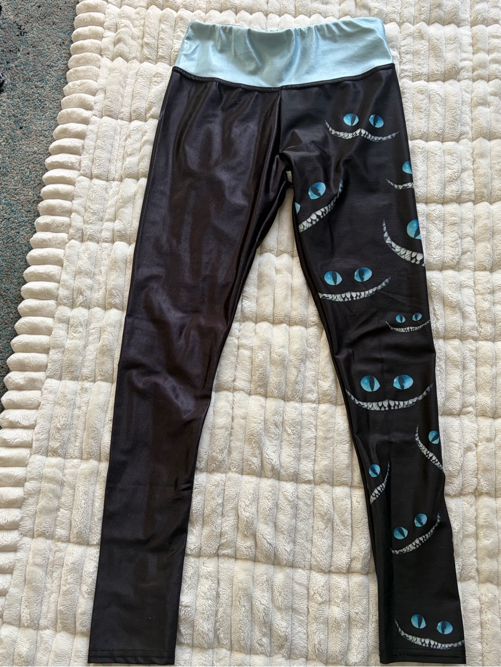 Lotus Leggings Black Leggings with Teal Eyes and Light Blue Waistband